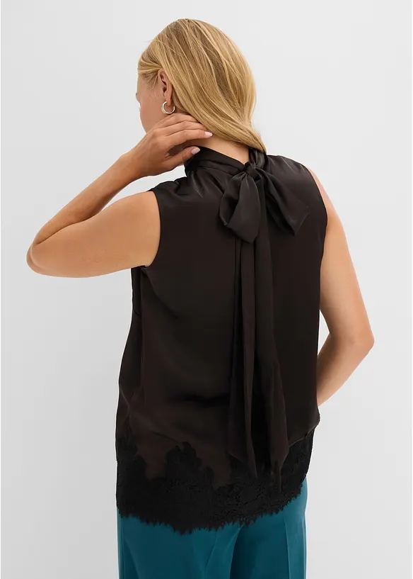 Schluppenbluse mit Spitzensaum in schwarz von hinten (im Anschnitt) - bonprix
