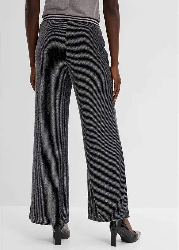 Jersey-Hose mit Glitzerstreifen in schwarz von hinten - bonprix