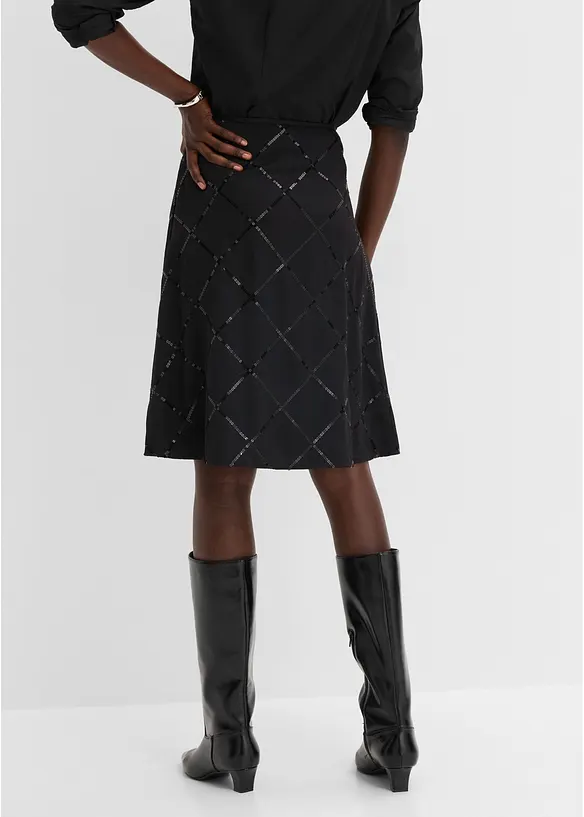 Rock mit Pailletten in schwarz von hinten - bonprix