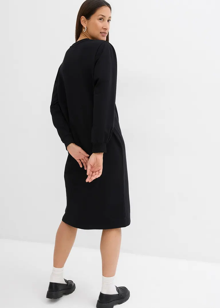Sweatkleid mit Puffärmeln in schwarz von hinten (Totalaufnahme) - bonprix