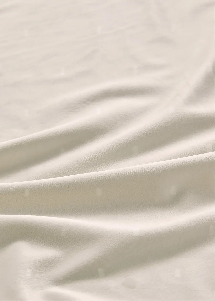 Dekostoff mit zarten Punkten in beige - bonprix