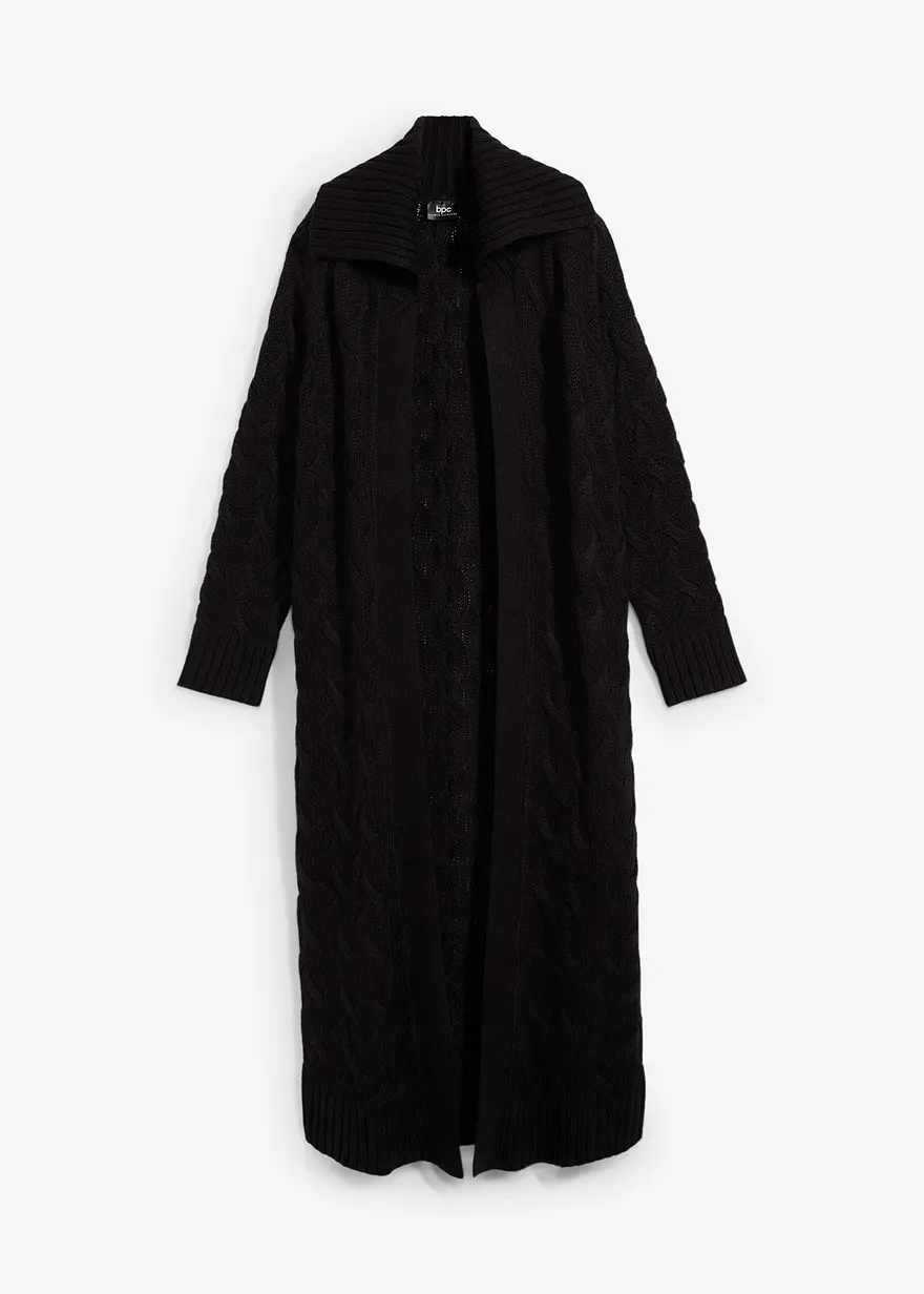 Langer Strickmantel aus Zopfstrick in schwarz von vorne - bonprix