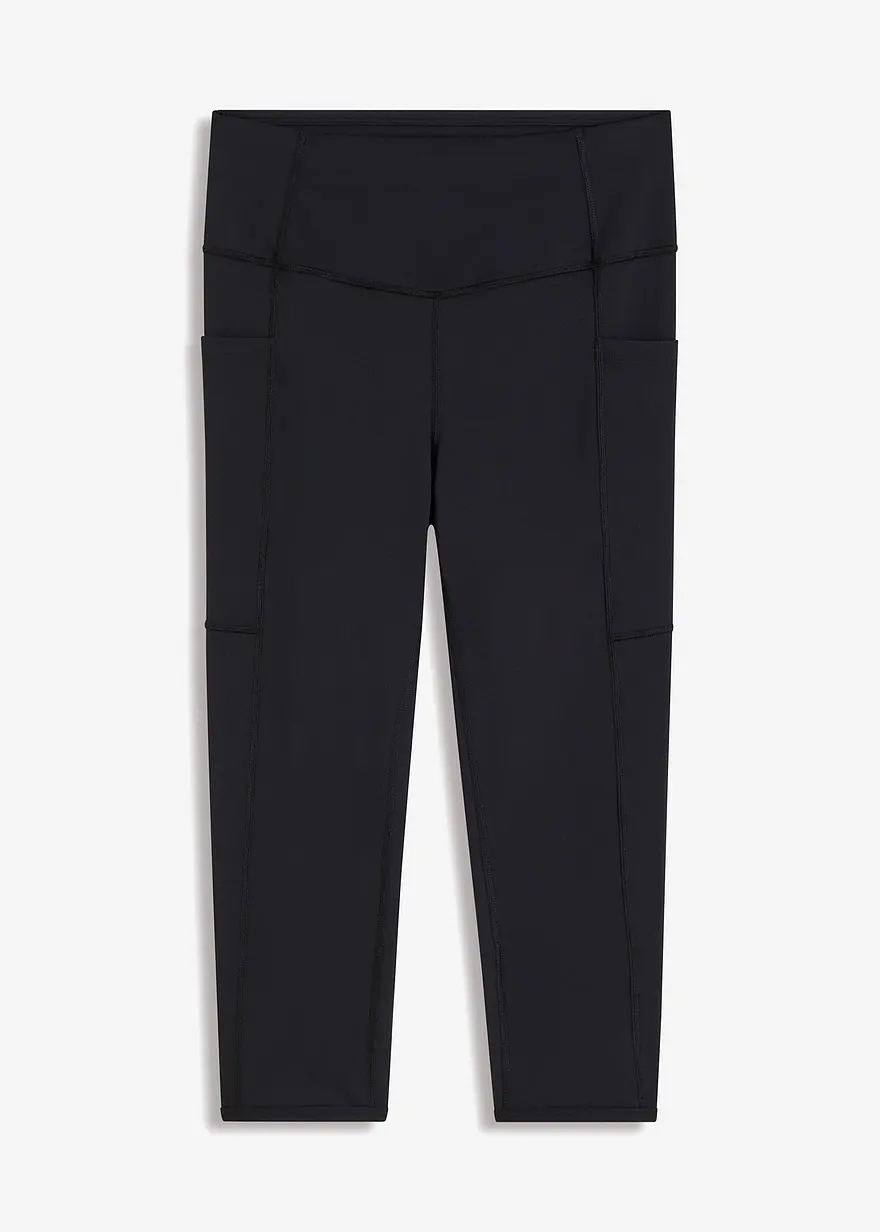 Komfort-Sport-Capri-Leggings mit Handytasche, schnelltrocknend in schwarz von vorne - bonprix